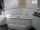 Bathroom remodel with custom tile and fixtures